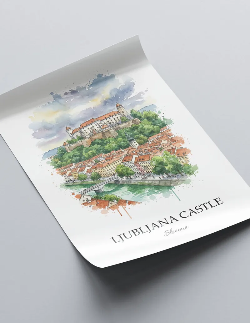 Framed wall art featuring Ljubljana Castle in Slovenia in a light wood frame leaning on the floor.