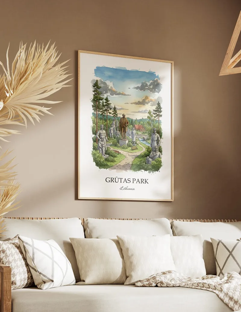 A gorgeous boho-inspired living space with a framed vintage travel poster of Gr_tas Park in Lithuania on display.