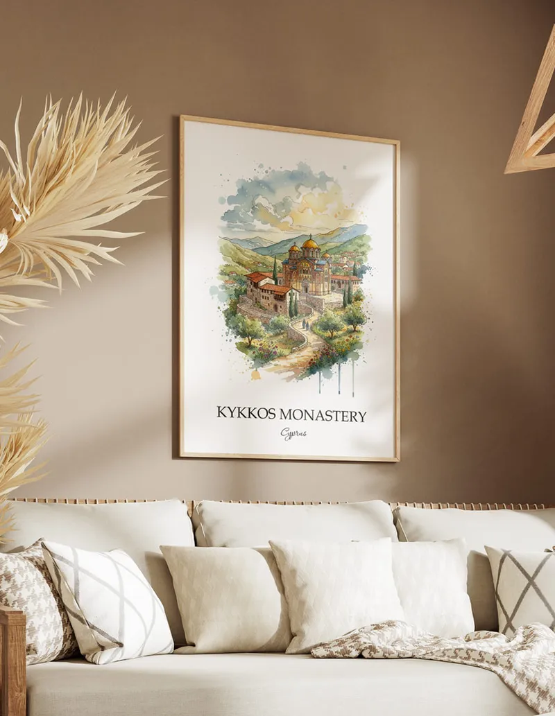 A gorgeous boho-inspired living space with a framed vintage travel poster of Kykkos Monastery in Cyprus on display.