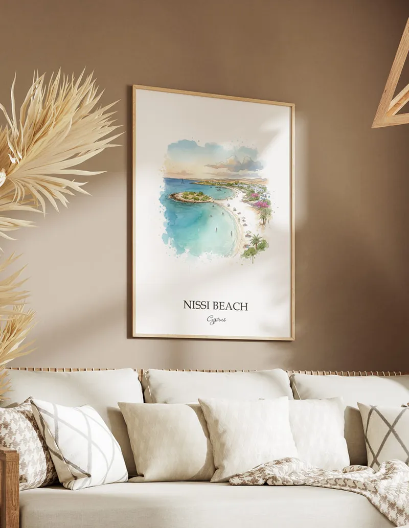 A gorgeous boho-inspired living space with a framed vintage travel poster of Nissi Beach in Cyprus on display.