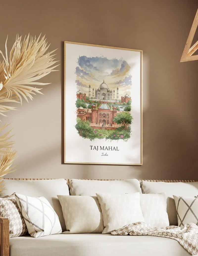 Framed wall art featuring Taj Mahal, India in a light wood frame hanging above a sofa in a modern living room.