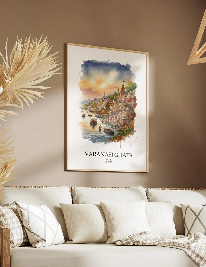 Framed wall art featuring Varanasi Ghats, India in a light wood frame hanging above a sofa in a modern living room.