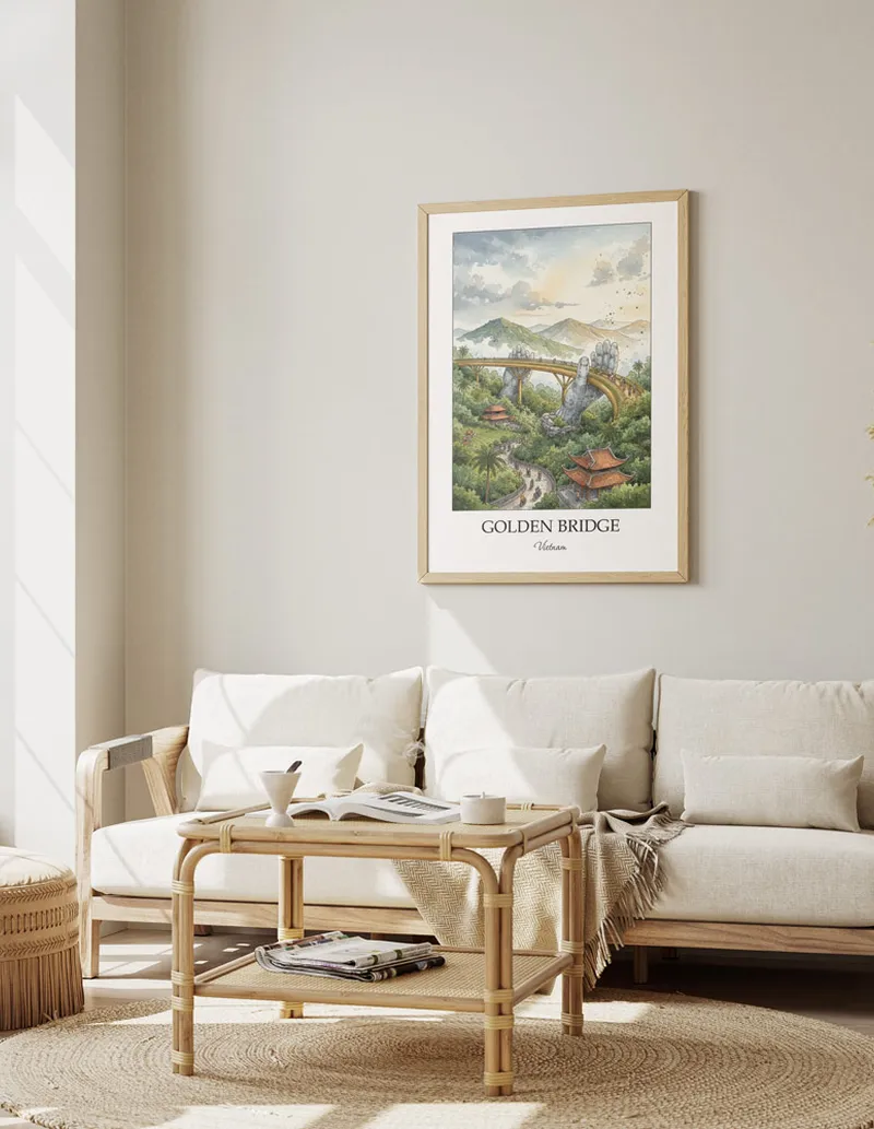 Minimalist poster of Golden Bridge in Vietnam in a light frame standing by a window in a boho style room.