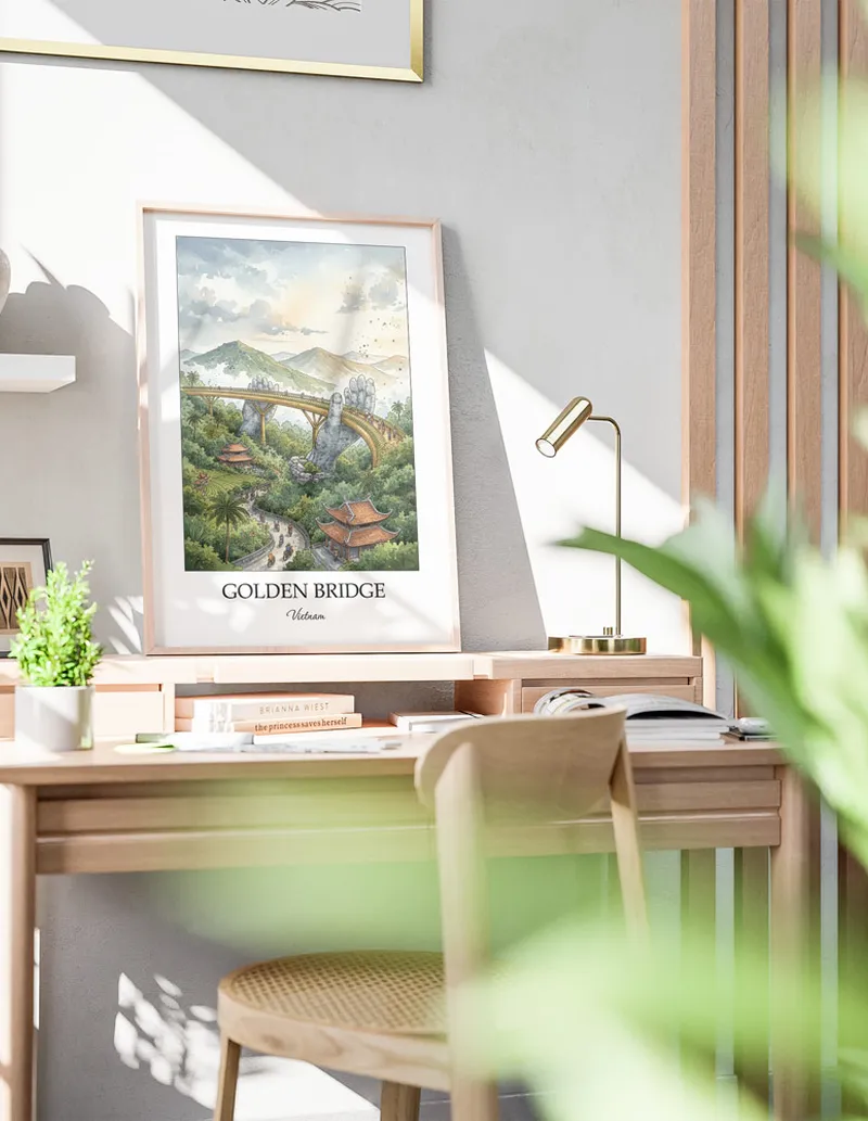 A gorgeous boho-inspired living space with a framed vintage travel poster of Golden Bridge in Vietnam on display.