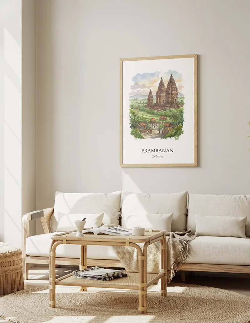 Minimalist poster of Prambanan in Indonesia in a light frame standing by a window in a boho style room.