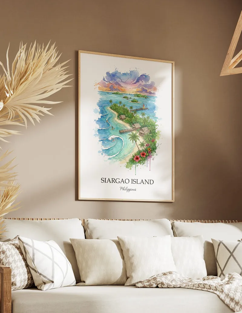 Framed wall art featuring Siargao Island, Philippines in a light wood frame hanging above a sofa in a modern living room.