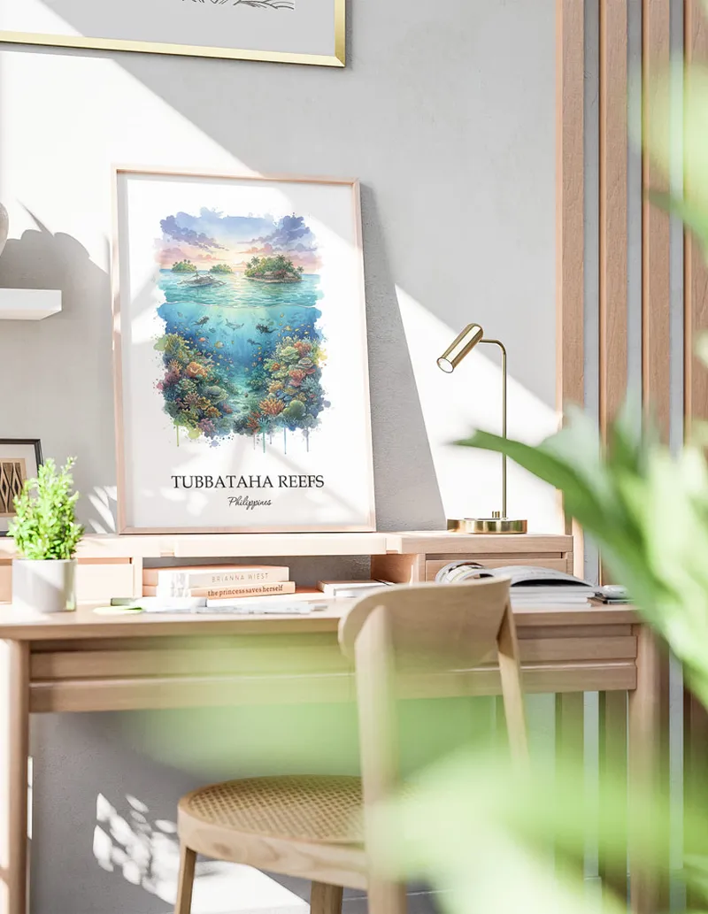 A gorgeous boho-inspired living space with a framed vintage travel poster of Tubbataha Reefs in Philippines on display.