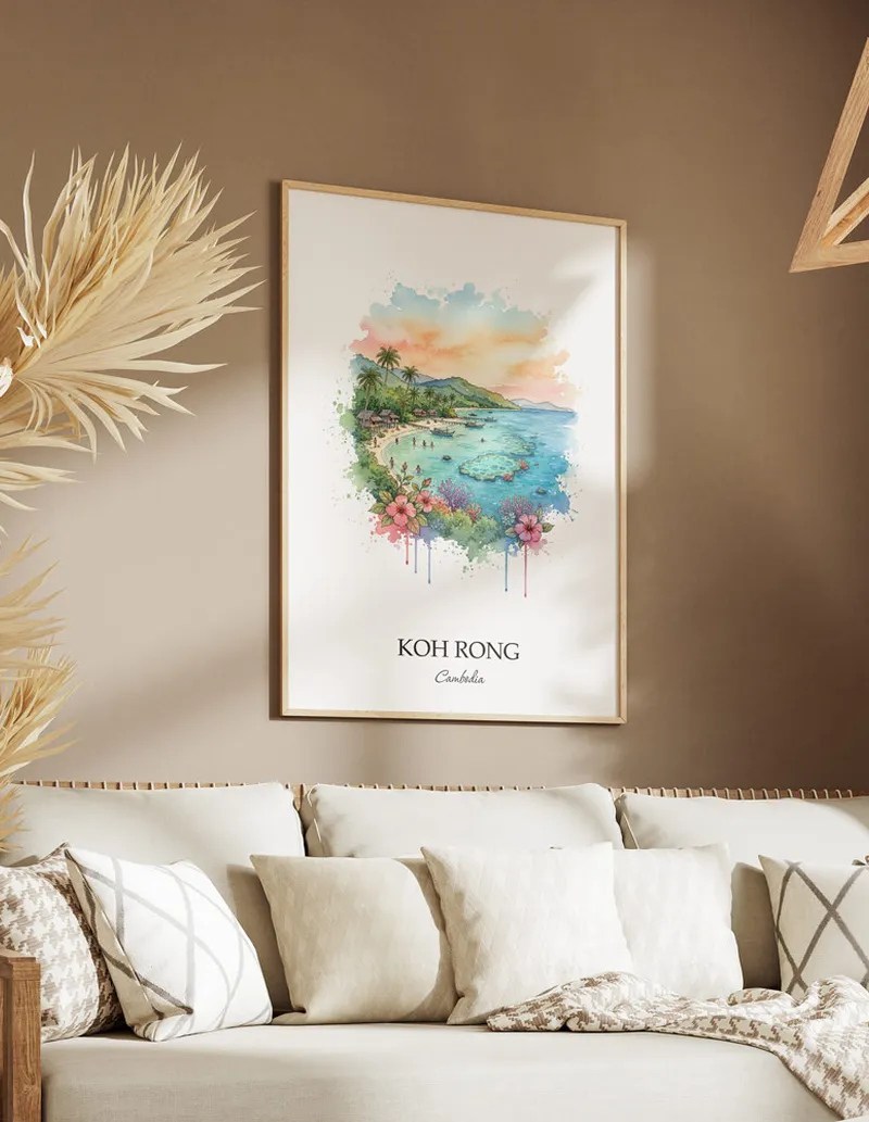 A gorgeous boho-inspired living space with a framed vintage travel poster of Koh Rong in Cambodia on display.