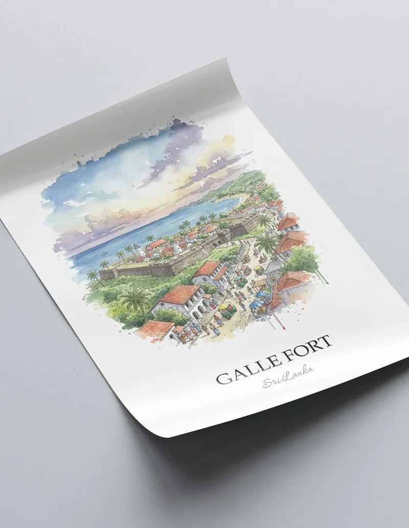 Framed wall art featuring Galle Fort in Sri Lanka in a light wood frame leaning on the floor.