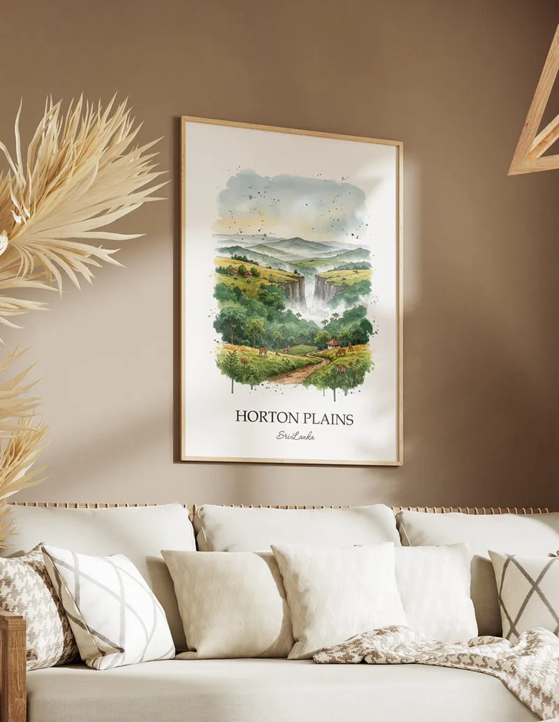 A gorgeous boho-inspired living space with a framed vintage travel poster of Horton Plains in Sri Lanka on display.