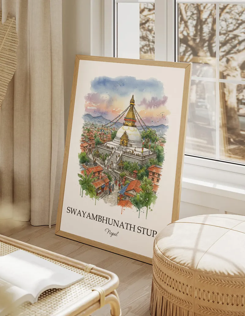 Framed wall art featuring Swayambhunath Stupa, Nepal in a light wood frame hanging above a sofa in a modern living room.