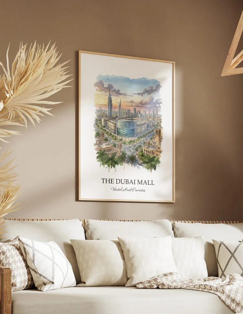A gorgeous boho-inspired living space with a framed vintage travel poster of The Dubai Mall in UAE on display.
