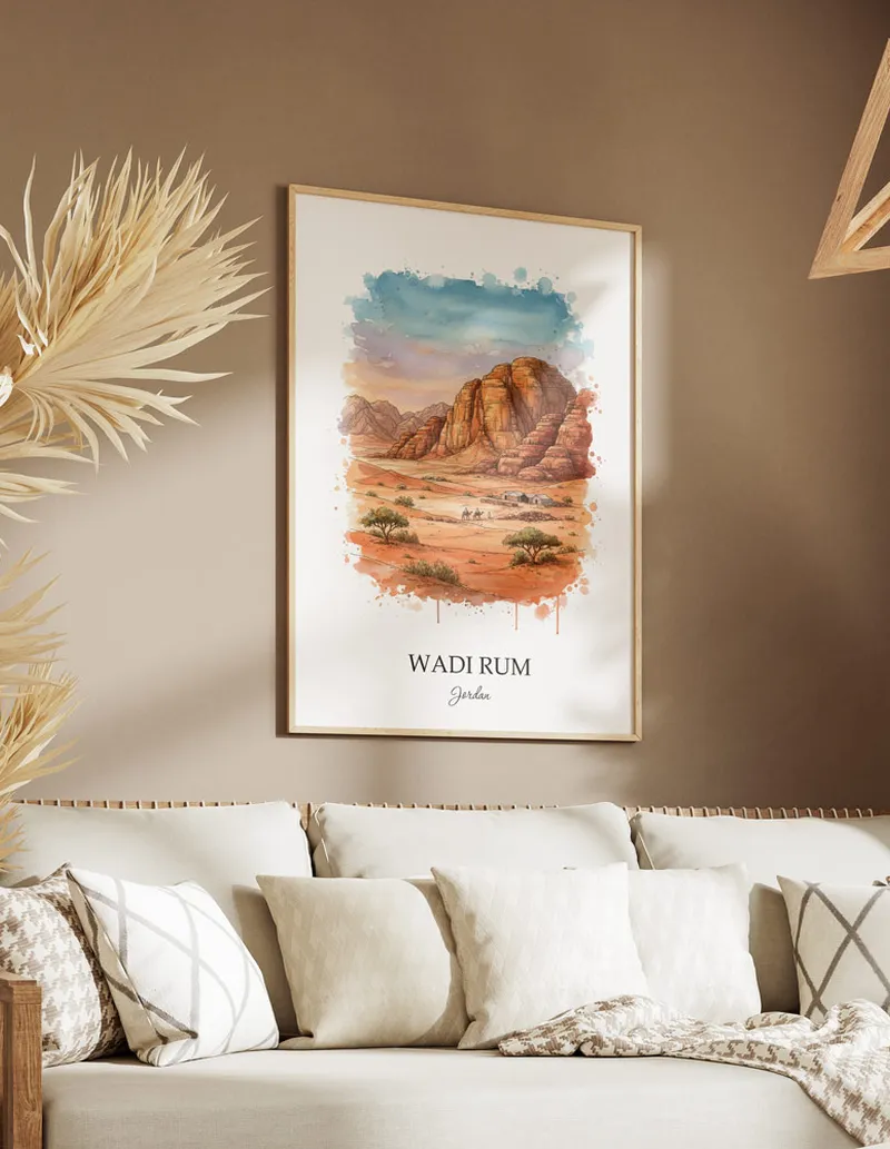 A gorgeous boho-inspired living space with a framed vintage travel poster of Wadi Rum in Jordan on display.