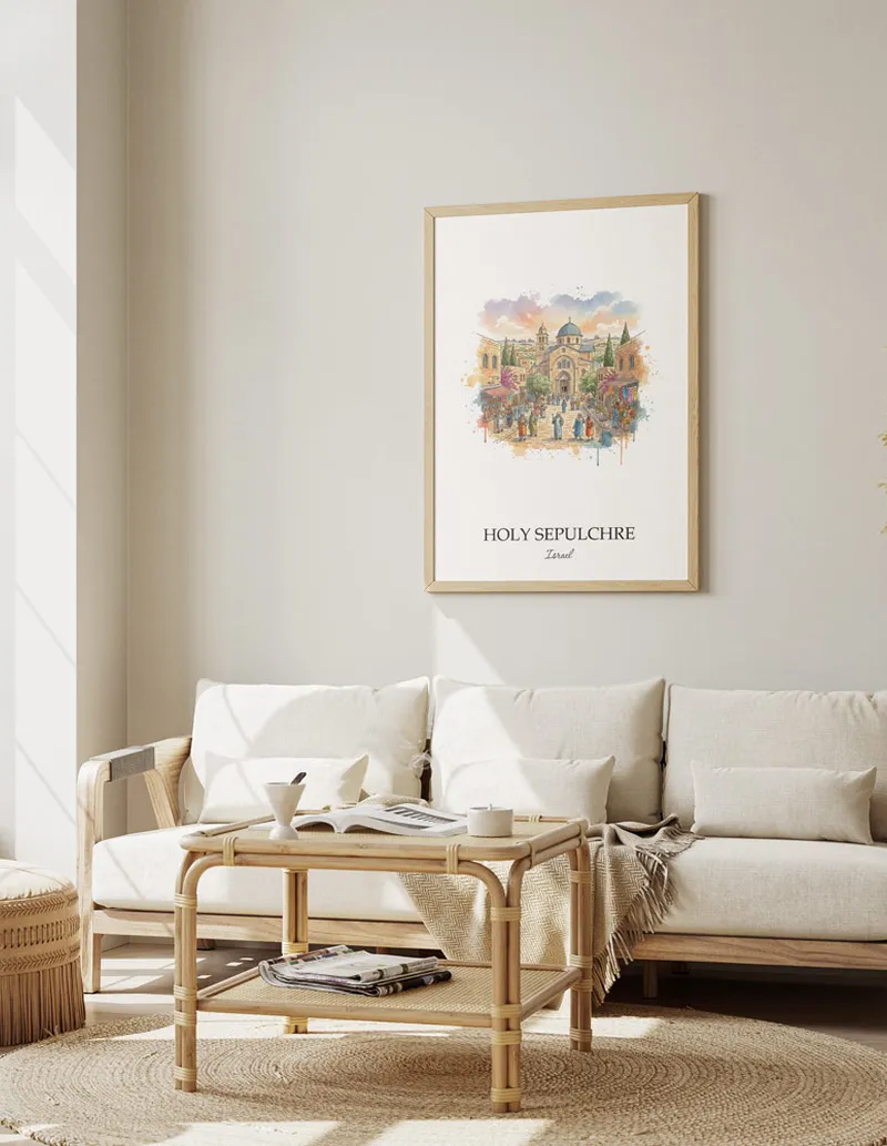 Vintage travel poster of Holy Sepulchre, Israel in a light frame displayed above a sofa in a bright boho interior.