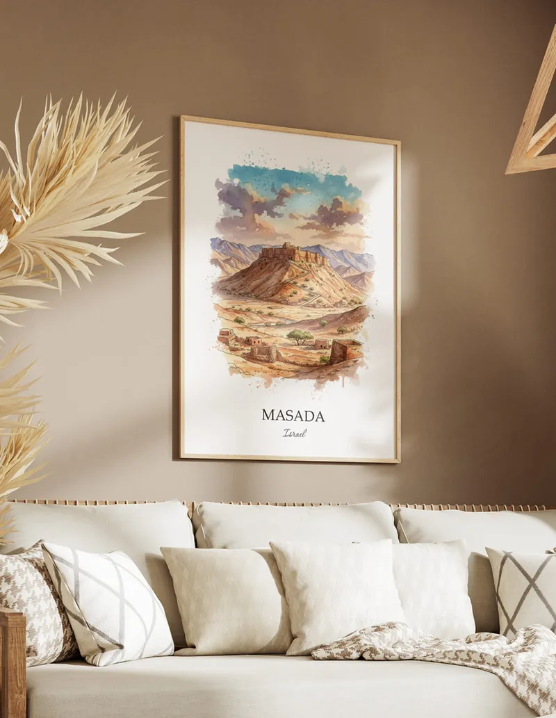A gorgeous boho-inspired living space with a framed vintage travel poster of Masada in Israel on display.
