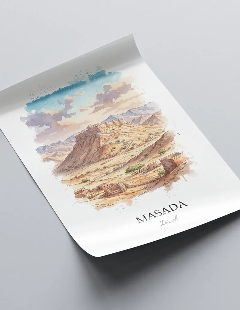 Framed wall art featuring Masada in Israel in a light wood frame leaning on the floor.
