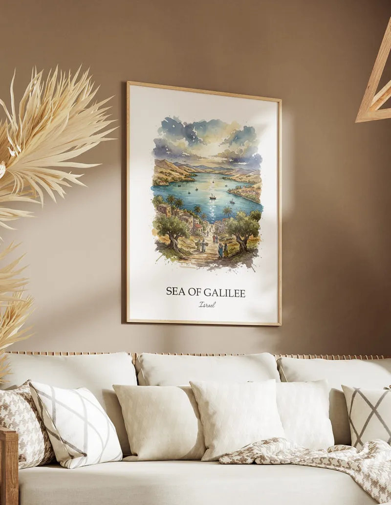 A gorgeous boho-inspired living space with a framed vintage travel poster of Sea of Galilee in Israel on display.