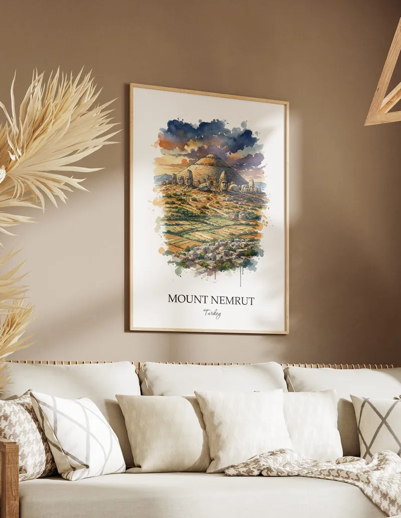 A gorgeous boho-inspired living space with a framed vintage travel poster of Mount Nemrut in Turkey on display.