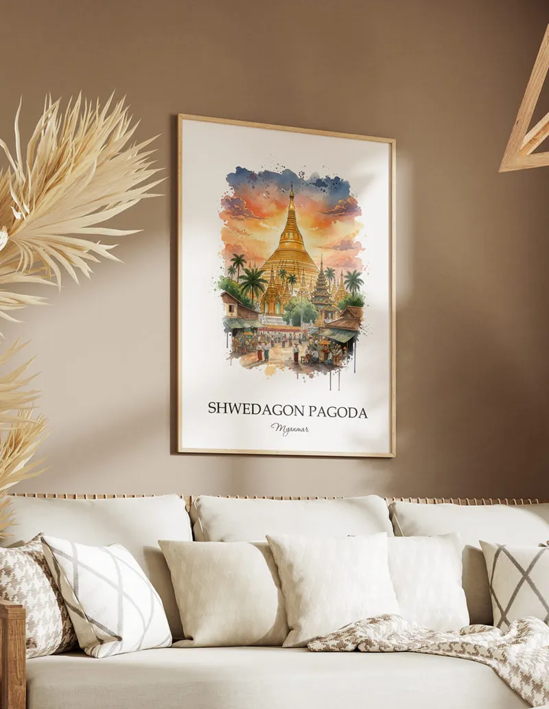 A gorgeous boho-inspired living space with a framed vintage travel poster of Shwedagon Pagoda in Myanmar on display.