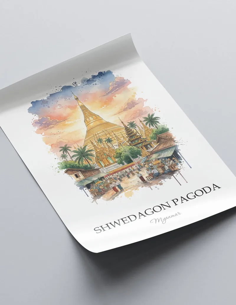 Framed wall art featuring Shwedagon Pagoda in Myanmar in a light wood frame leaning on the floor.