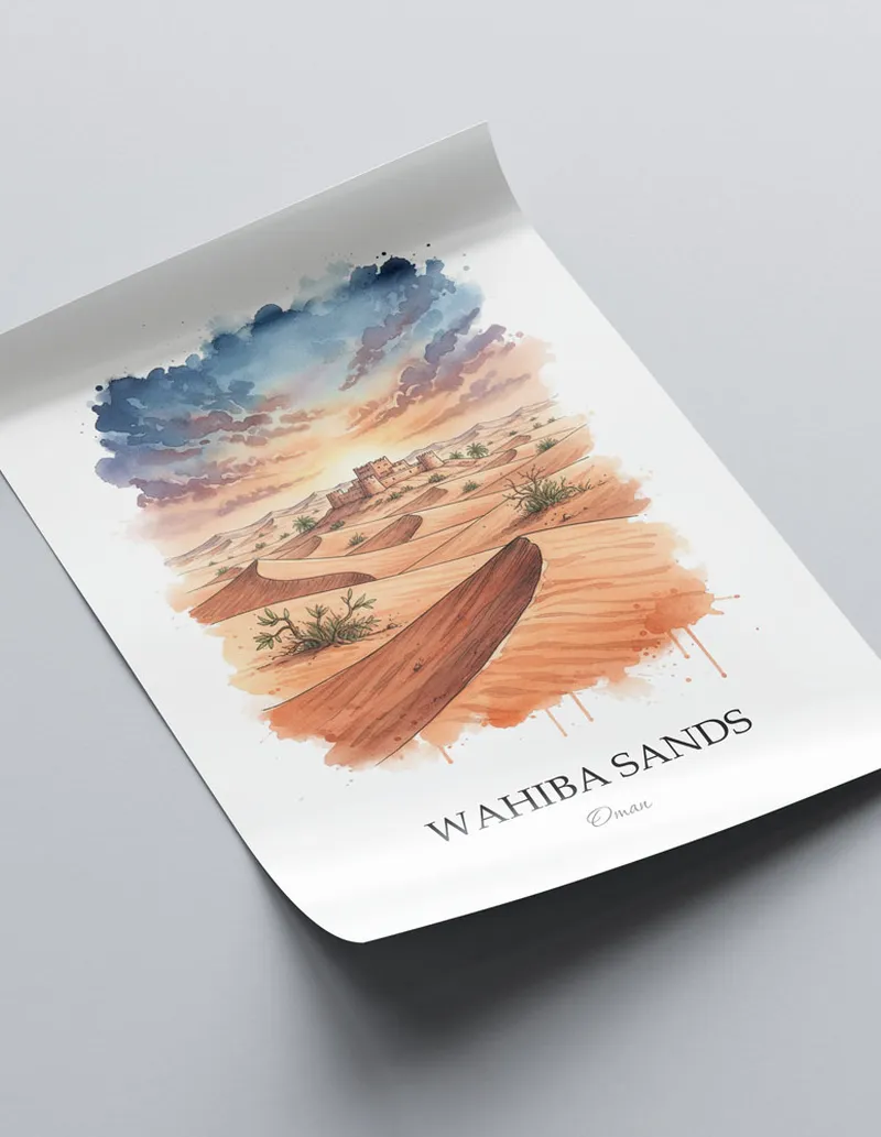 Framed wall art featuring Wahiba Sands in Oman in a light wood frame leaning on the floor.