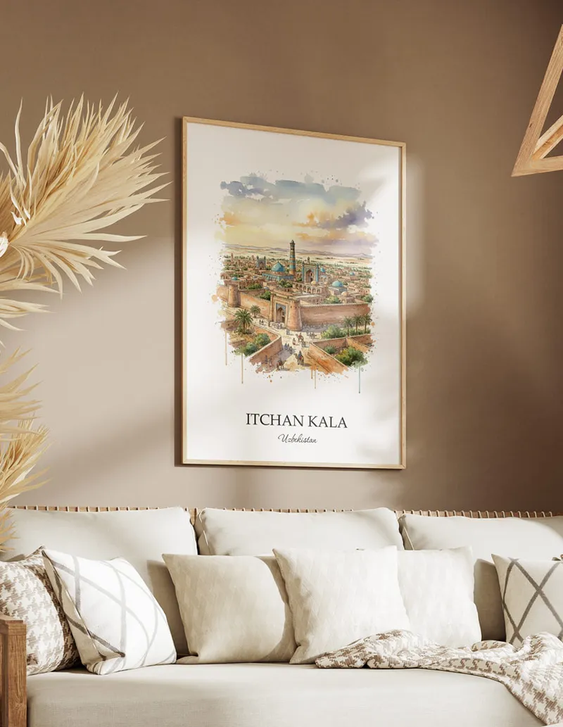 A gorgeous boho-inspired living space with a framed vintage travel poster of Itchan Kala in Uzbekistan on display.