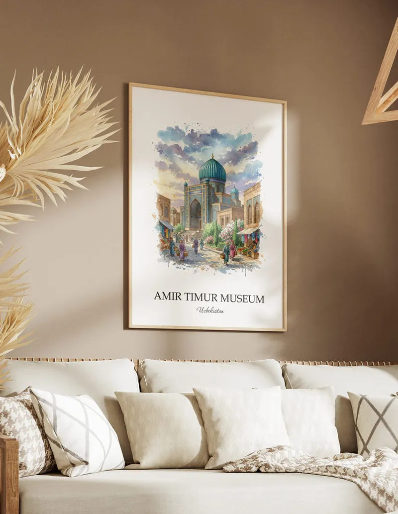 A gorgeous boho-inspired living space with a framed vintage travel poster of Amir Timur Museum in Uzbekistan on display.