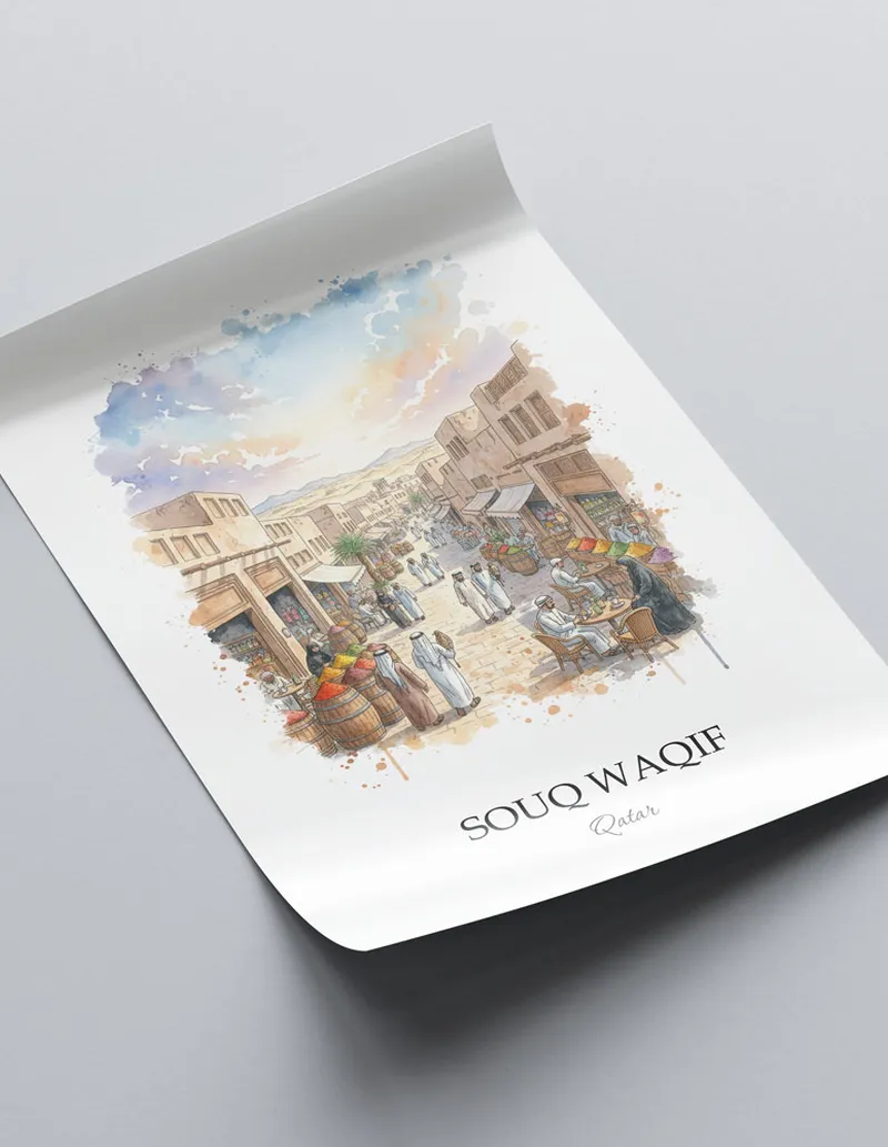 Framed wall art featuring Souq Waqif in Qatar in a light wood frame leaning on the floor.