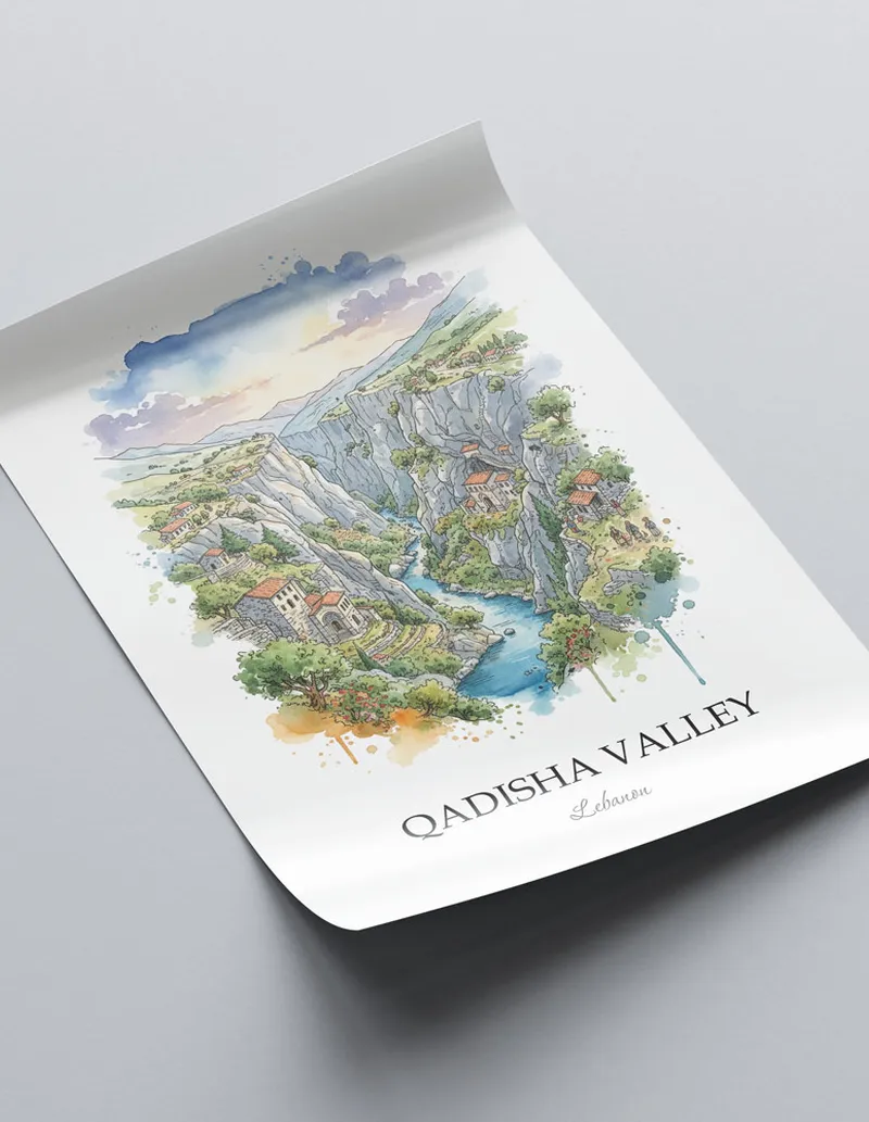 Framed wall art featuring Qadisha Valley in Lebanon in a light wood frame leaning on the floor.