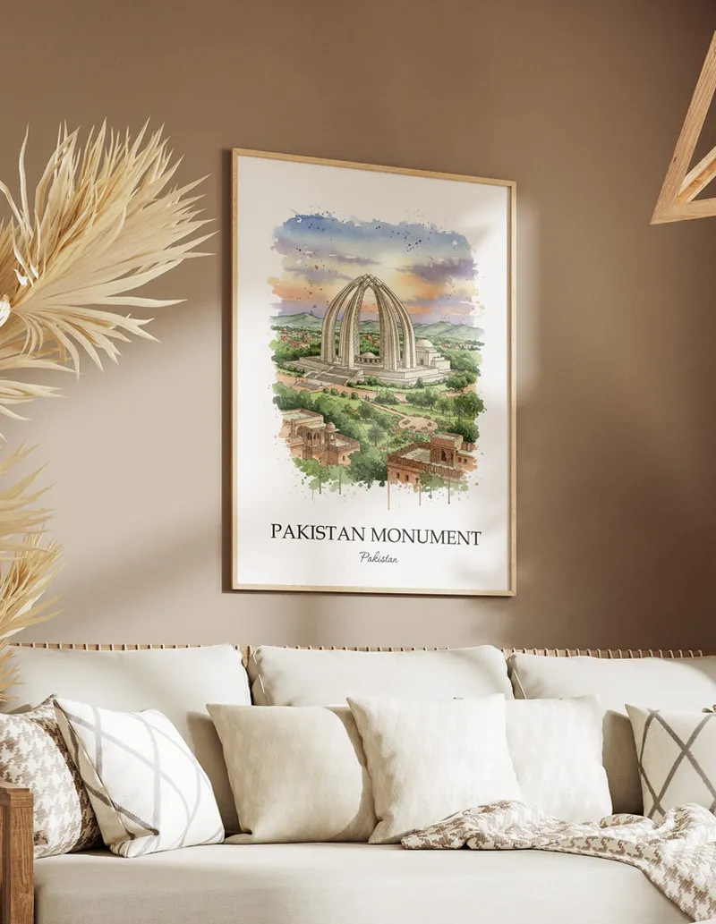 A gorgeous boho-inspired living space with a framed vintage travel poster of Pakistan Monument in Pakistan on display.