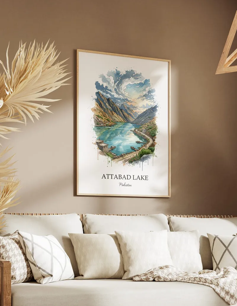 A gorgeous boho-inspired living space with a framed vintage travel poster of Attabad Lake in Pakistan on display.