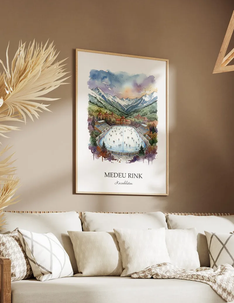 A gorgeous boho-inspired living space with a framed vintage travel poster of Medeu Rink in Kazakhstan on display.