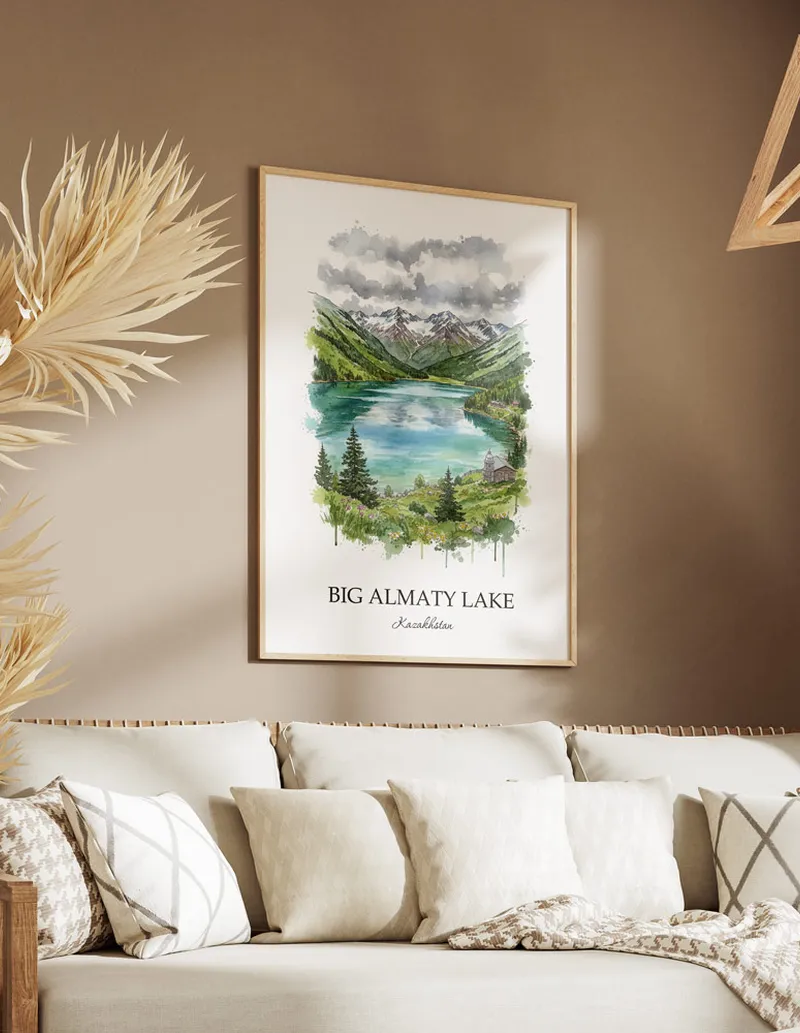 A gorgeous boho-inspired living space with a framed vintage travel poster of Big Almaty Lake in Kazakhstan on display.