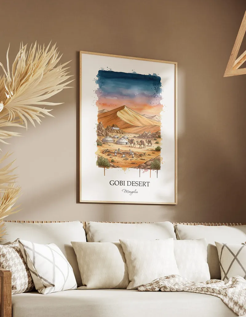 Cozy, well-lit workspace with a minimalist poster of Gobi Desert, Mongolia in a light frame sitting on the desk.