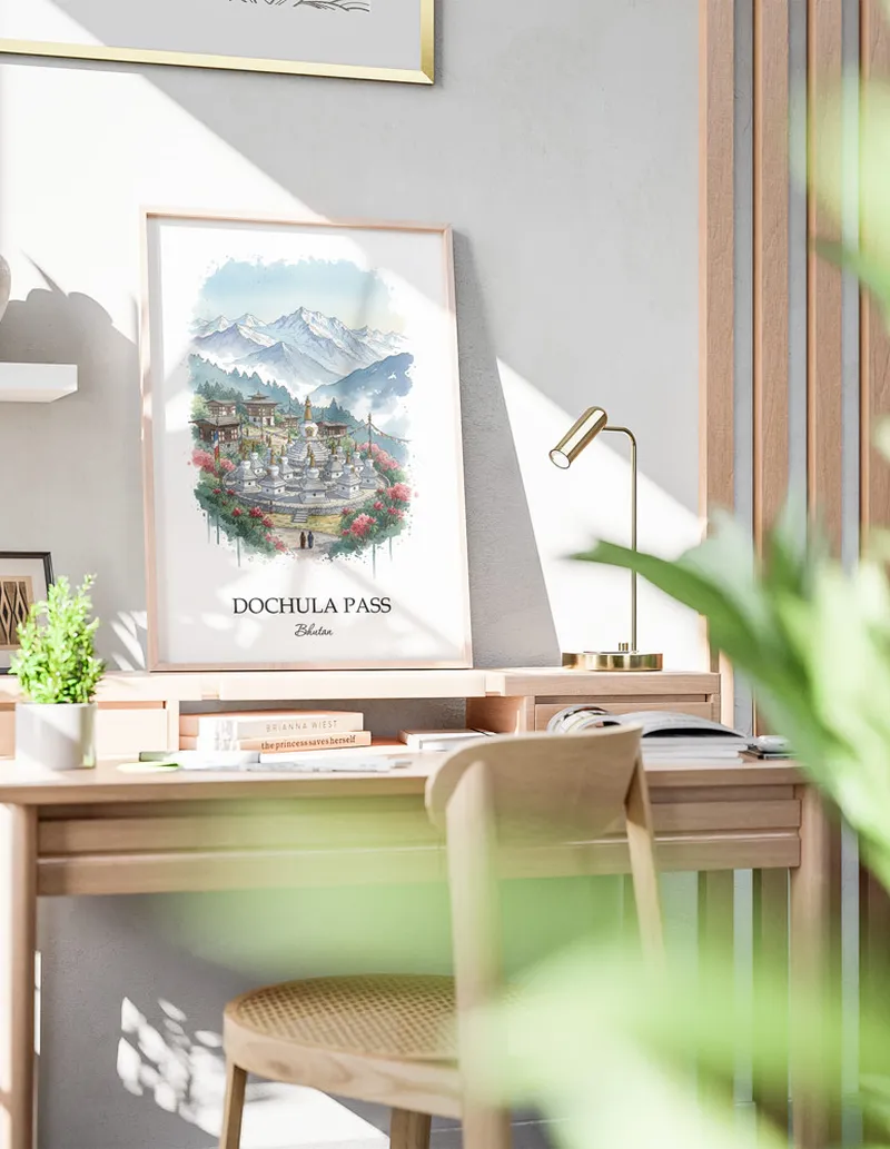 A close-up of a high-quality paper print featuring the Dochula Pass in Bhutan minimalist design.