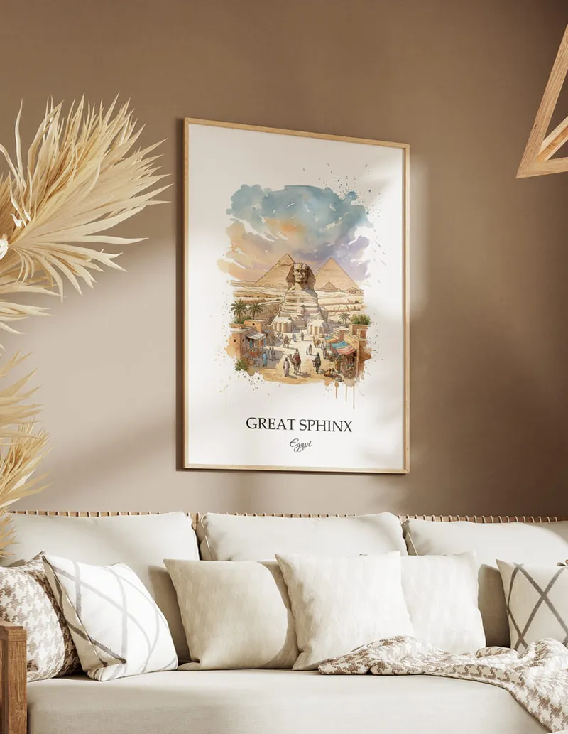 Cozy, well-lit workspace with a minimalist poster of Great Sphinx, Egypt in a light frame sitting on the desk.