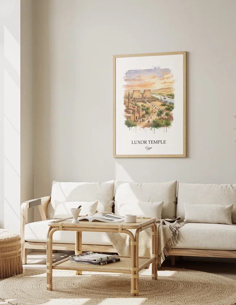 A gorgeous boho-inspired living space with a framed vintage travel poster of Luxor Temple in Egypt on display.