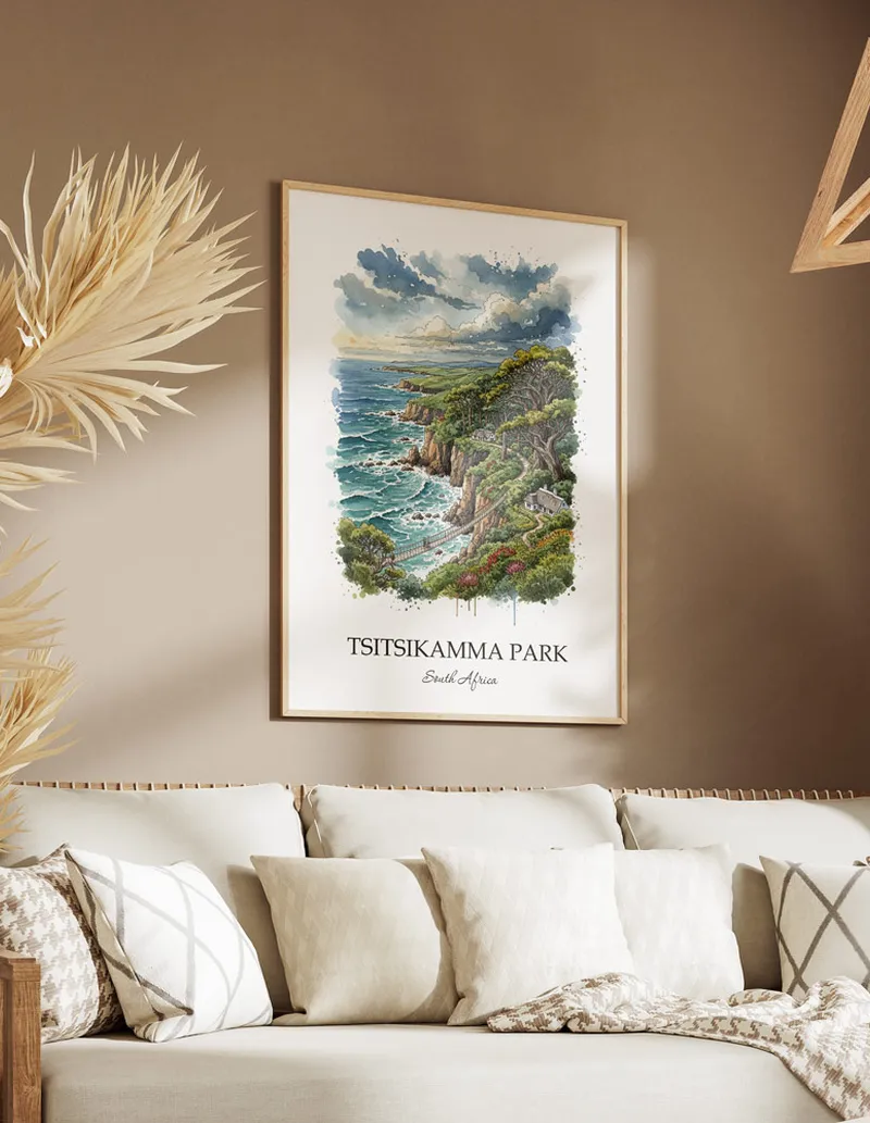 Cozy, well-lit workspace with a minimalist poster of Tsitsikamma Park, South Africa in a light frame sitting on the desk.