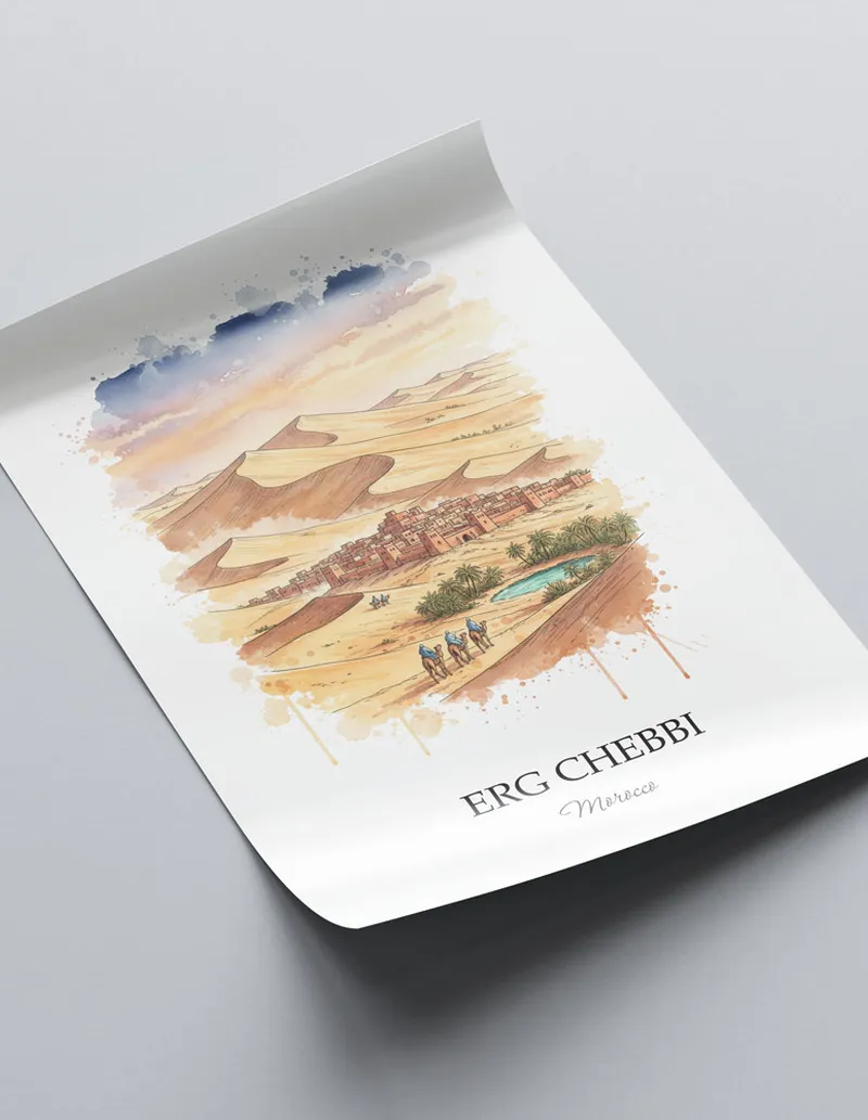 Minimalist poster of Erg Chebbi in Morocco in a light frame standing on the floor in a dark moody interior.