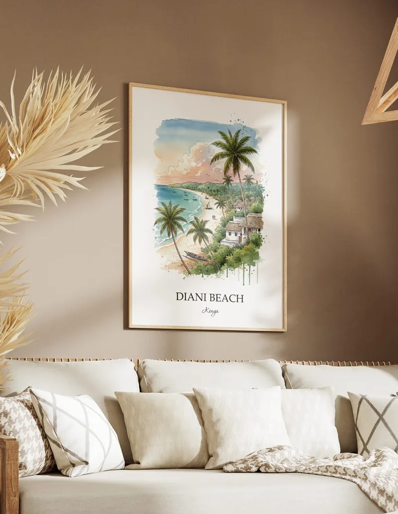 Cozy, well-lit workspace with a minimalist poster of Diani Beach, Kenya in a light frame sitting on the desk.