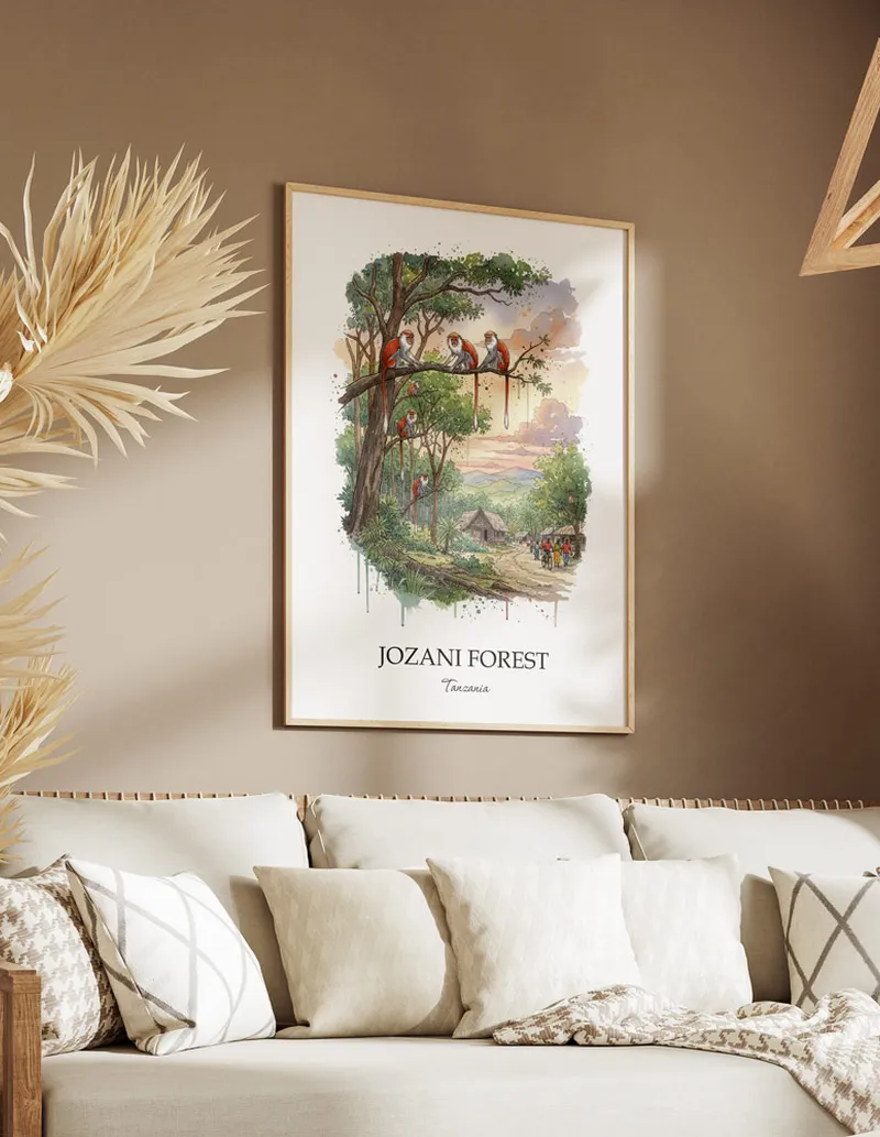 Cozy, well-lit workspace with a minimalist poster of Jozani Forest, Tanzania in a light frame sitting on the desk.