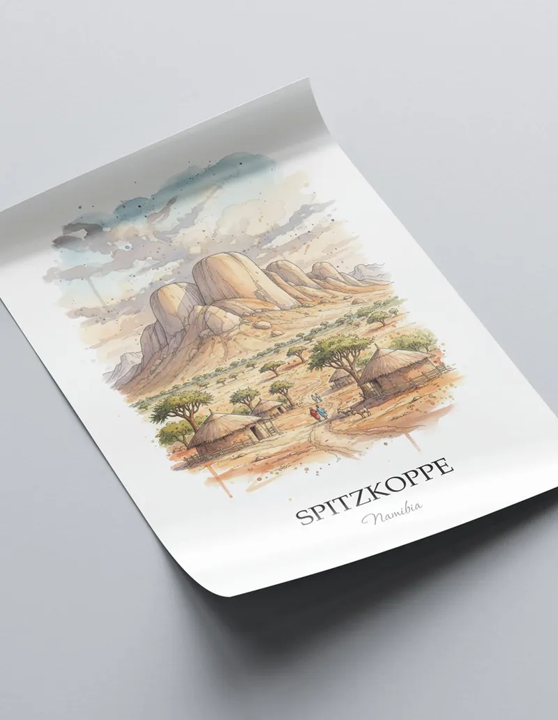 Minimalist poster of Spitzkoppe in Namibia in a light frame standing on the floor in a dark moody interior.