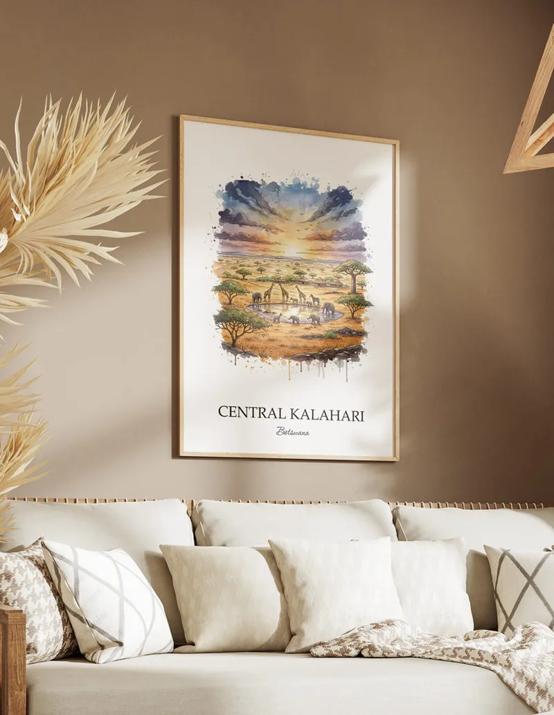 Cozy, well-lit workspace with a minimalist poster of Central Kalahari, Botswana in a light frame sitting on the desk.