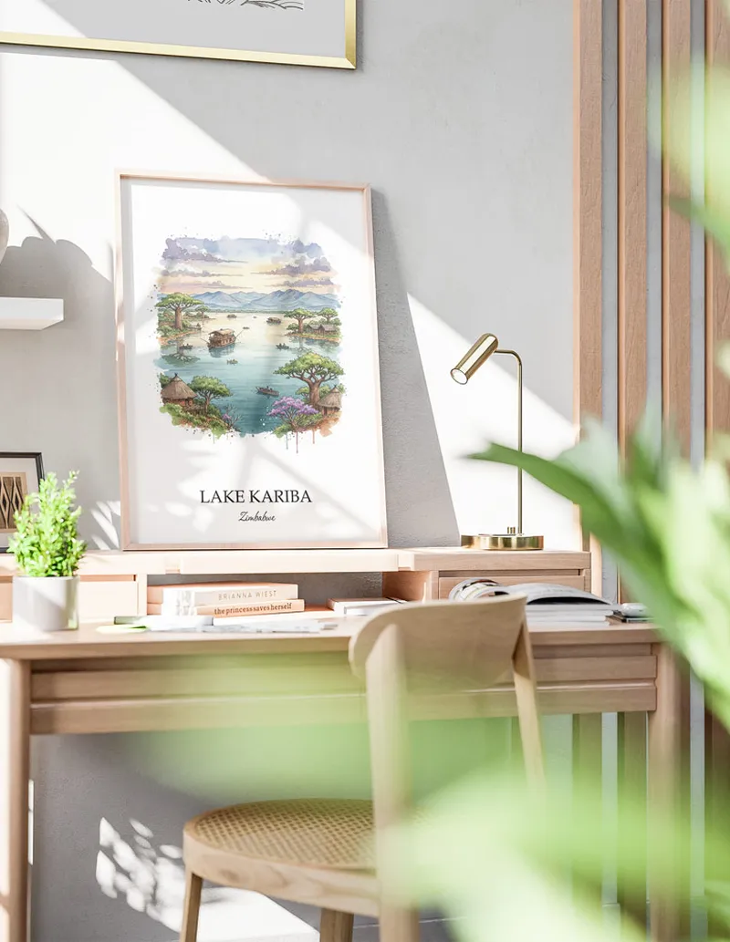 Framed wall art featuring Lake Kariba in Zimbabwe in a light wood frame leaning on the floor.