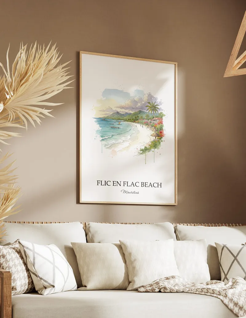 A gorgeous boho-inspired living space with a framed vintage travel poster of Flic en Flac Beach in Mauritius on display.