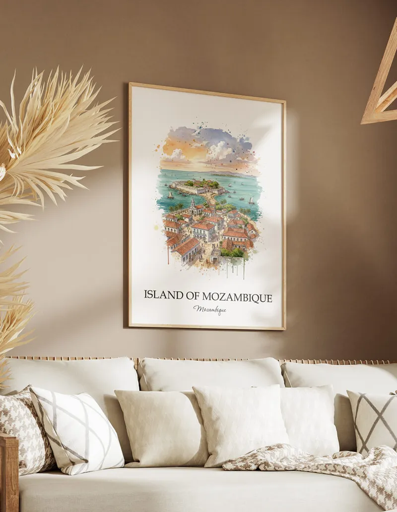A gorgeous boho-inspired living space with a framed vintage travel poster of Island of Mozambique in Mozambique on display.