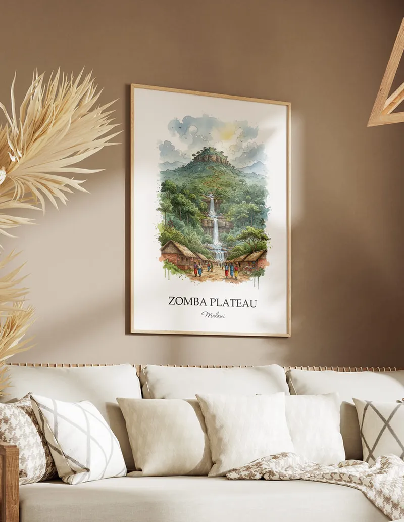A gorgeous boho-inspired living space with a framed vintage travel poster of Zomba Plateau in Malawi on display.