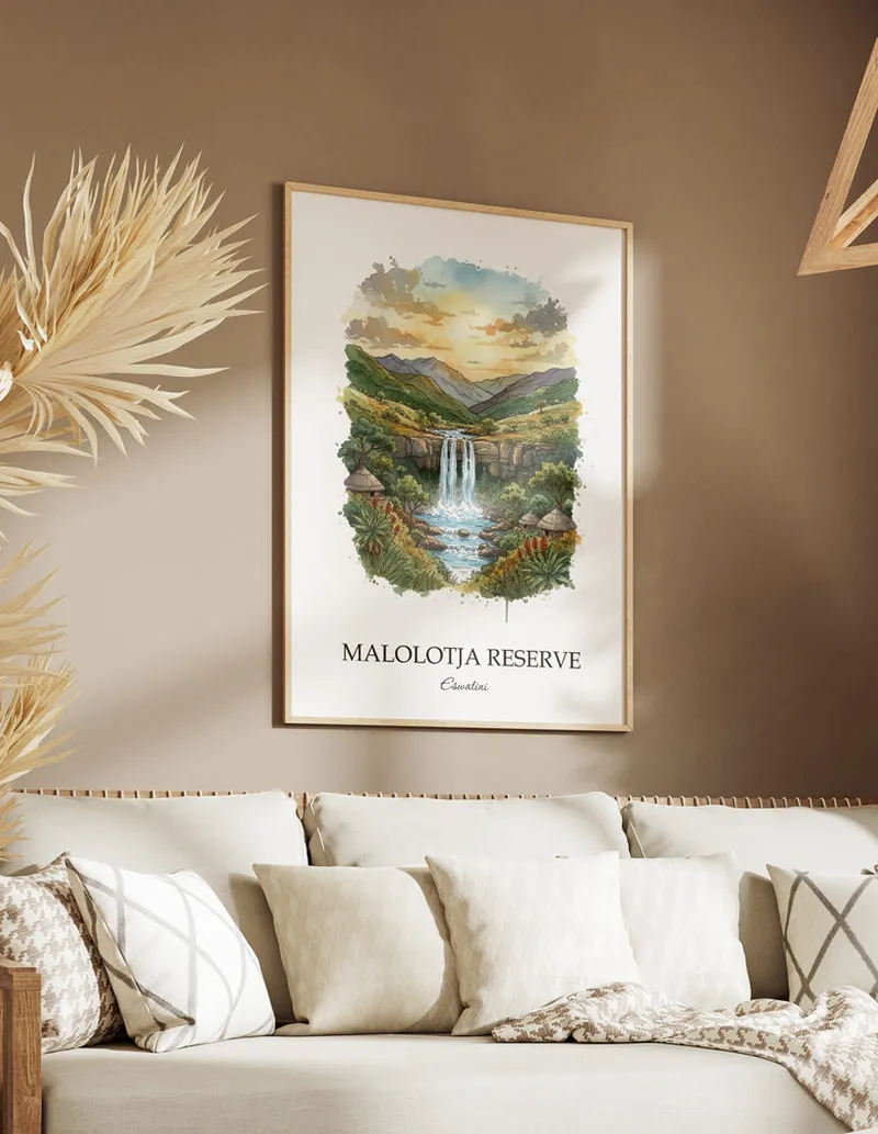 A gorgeous boho-inspired living space with a framed vintage travel poster of Malolotja Reserve in Eswatini on display.