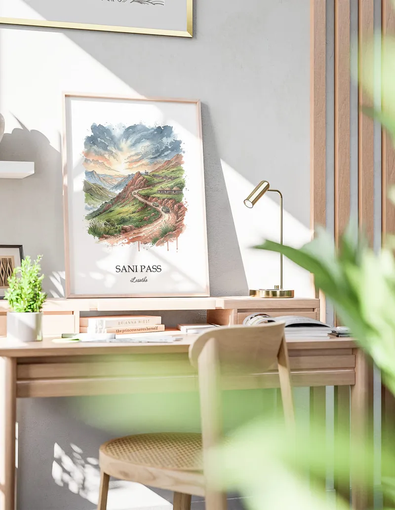 A clean and modern mockup showing a framed Sani Pass, Lesotho print on a minimalist background.