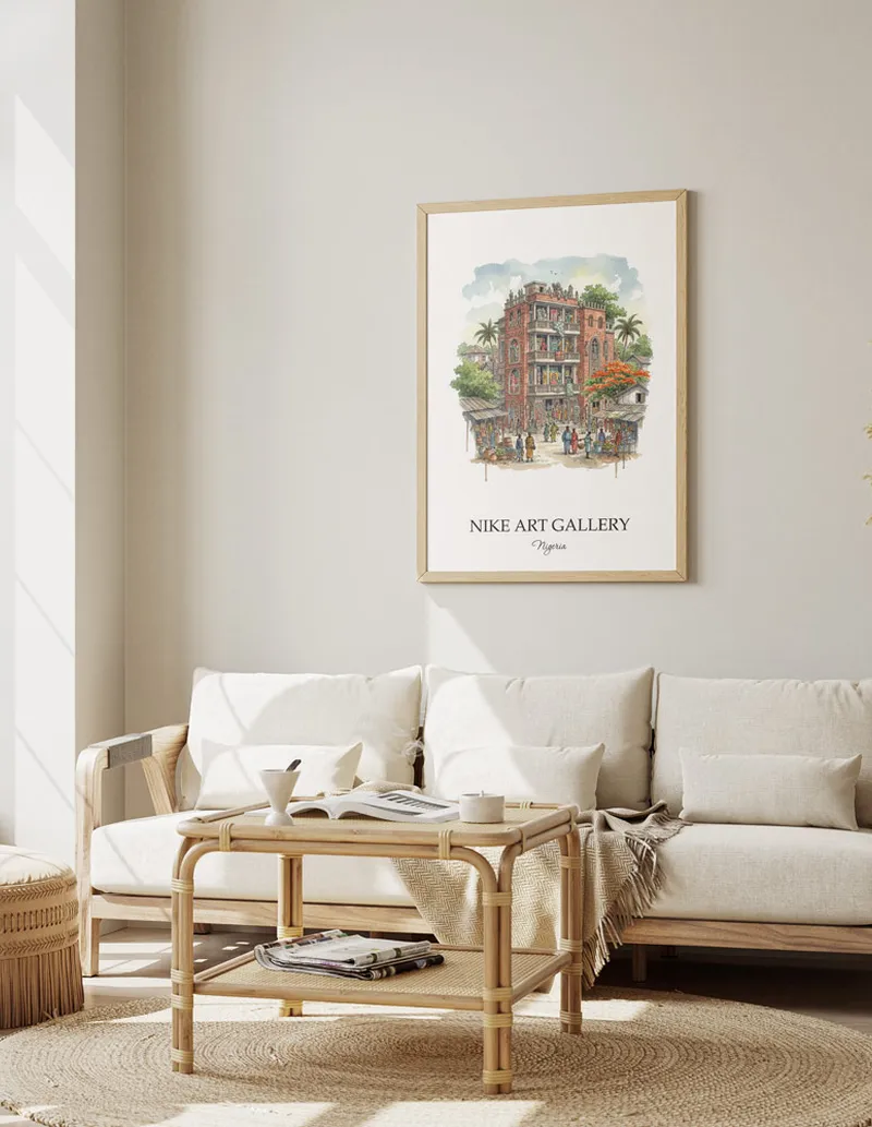 A gorgeous boho-inspired living space with a framed vintage travel poster of Nike Art Gallery in Nigeria on display.